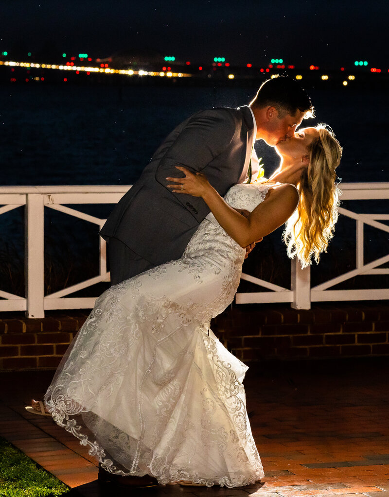 Couple kisses at Chesapeake Bay Beach club, Maryland Wedding Photographer