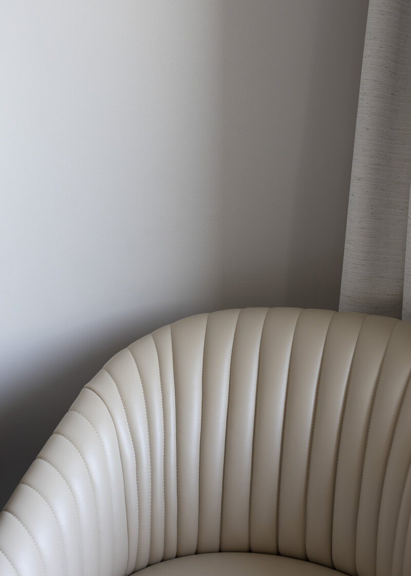  image  of a chair on a website for therapy and coaching for moms of color