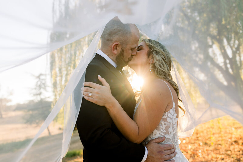 Bride and groom looking at each other