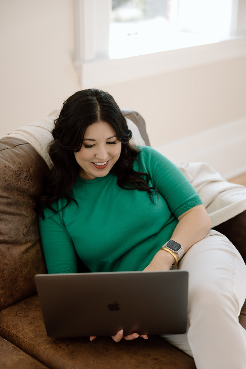 Shanté Gorman, CEO and founder of Sugarpunch Marketing, creating a social media content strategy on her laptop. Perfectly captures Sugarpunch Marketing's approach to personalized social media management for service-based businesses.