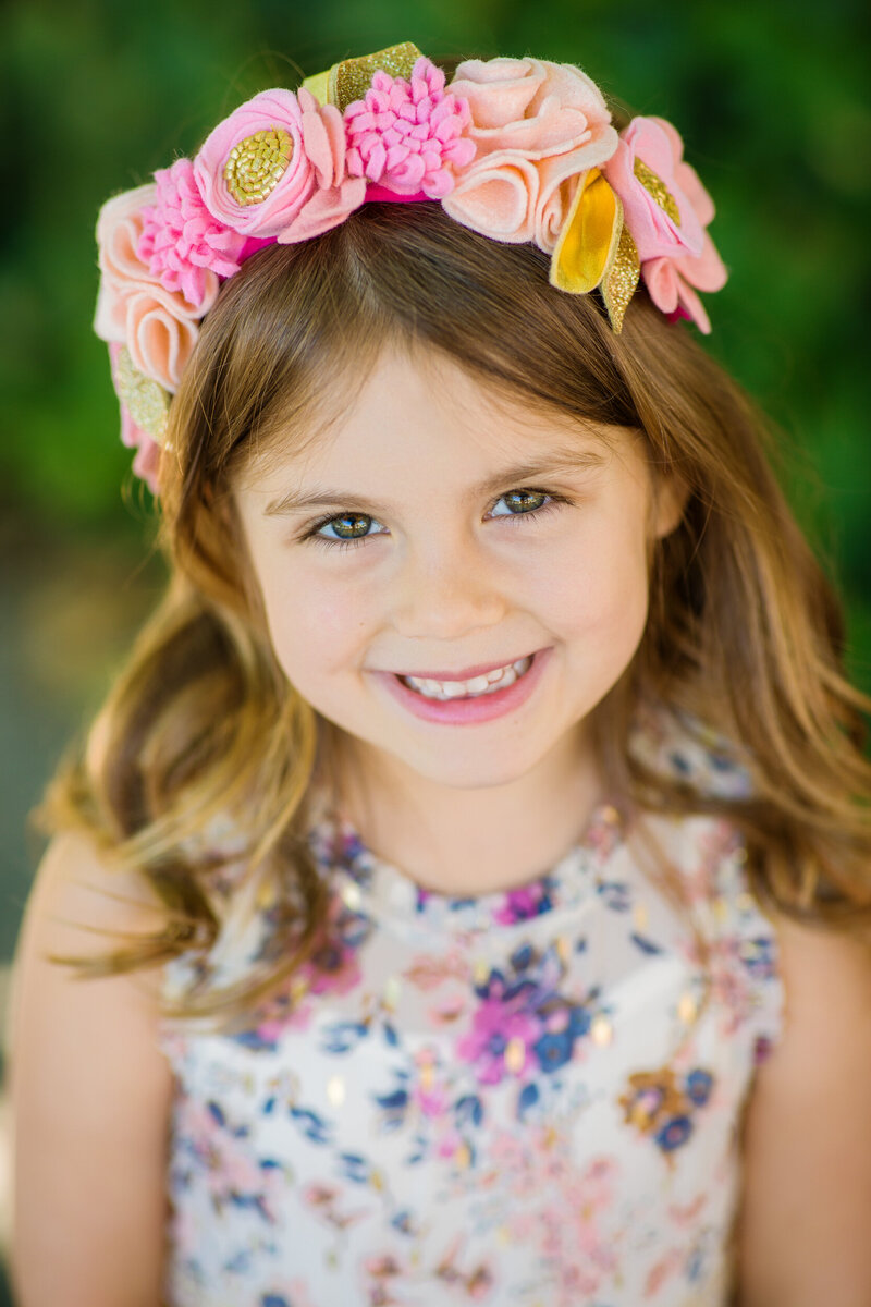 Little girl at spring Mini Session wearing a flower crown
