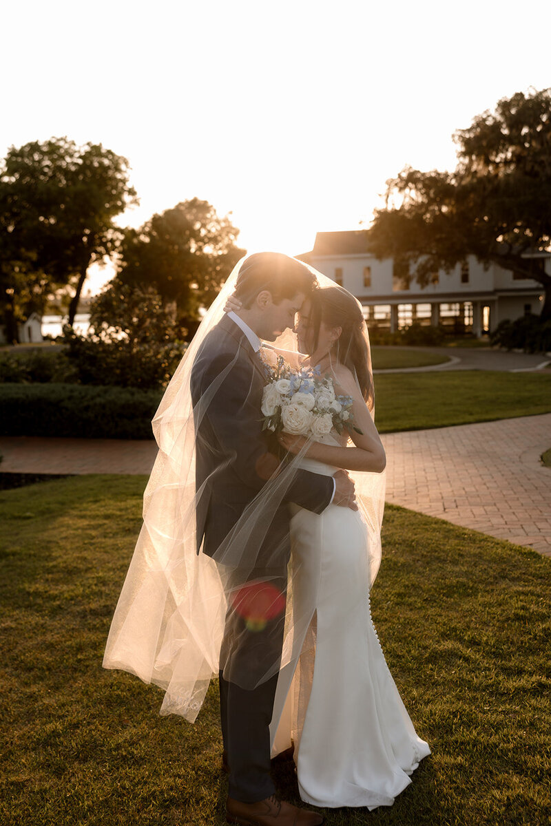 beautiful bride in front of the Howey mansion wedding venue