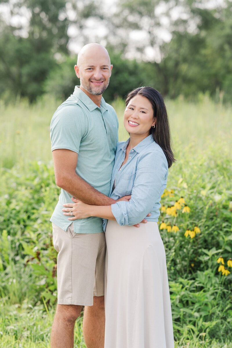 a husband and wife embracing