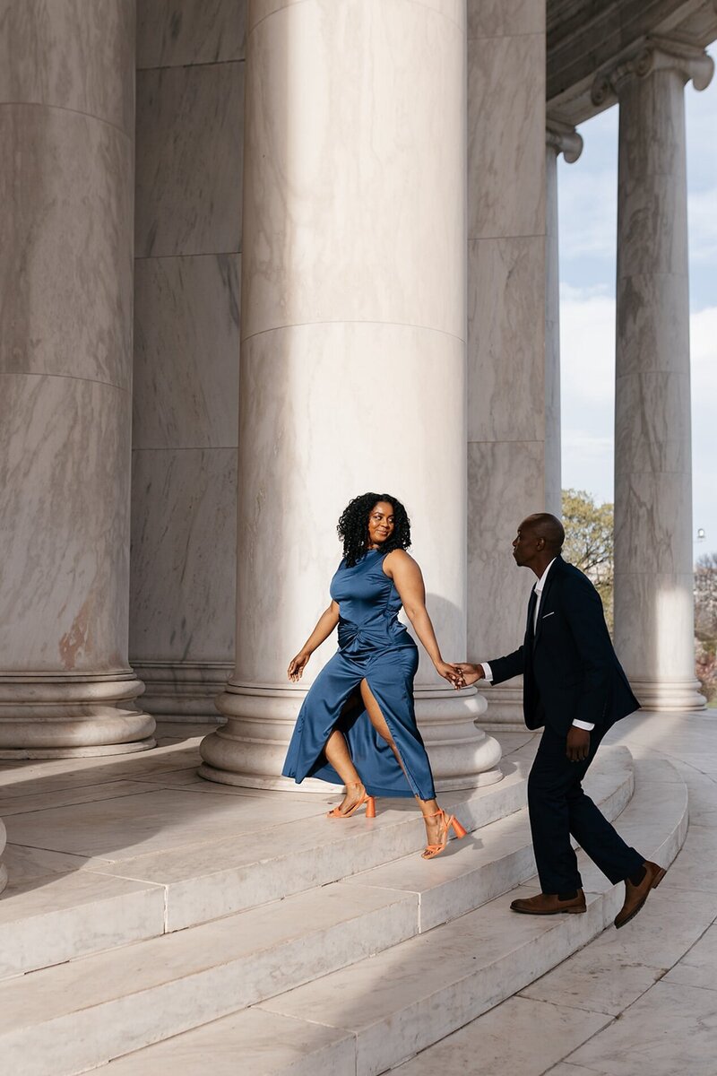 indie west photo portfolio image of couple walking up stairs for engagement session