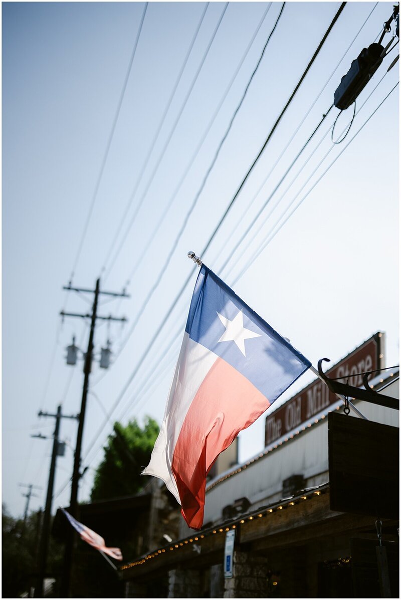 Texas flag flying on the square in Wimberley Texas