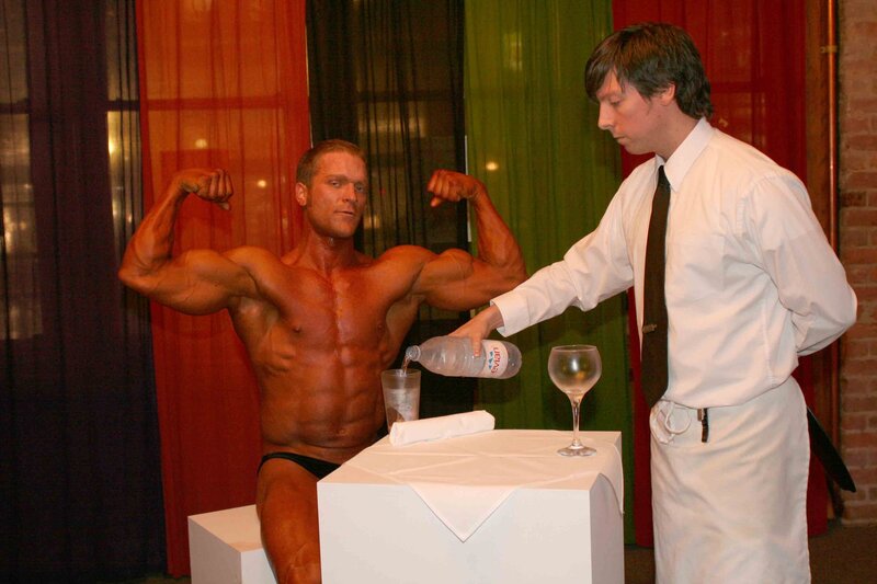 Brent Ray Fraser Posing on Stage The Transitional Culture being Served Wine By Professional Waiter As Art 2005