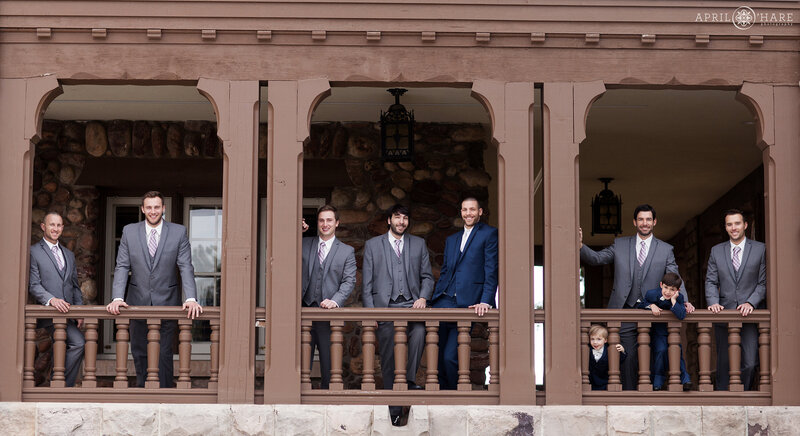 Groom with his groomsmen on the Front Veranda of Highlands Ranch Mansion in Colorado