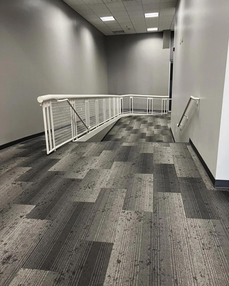 Another angle of the gray patterned carpet.