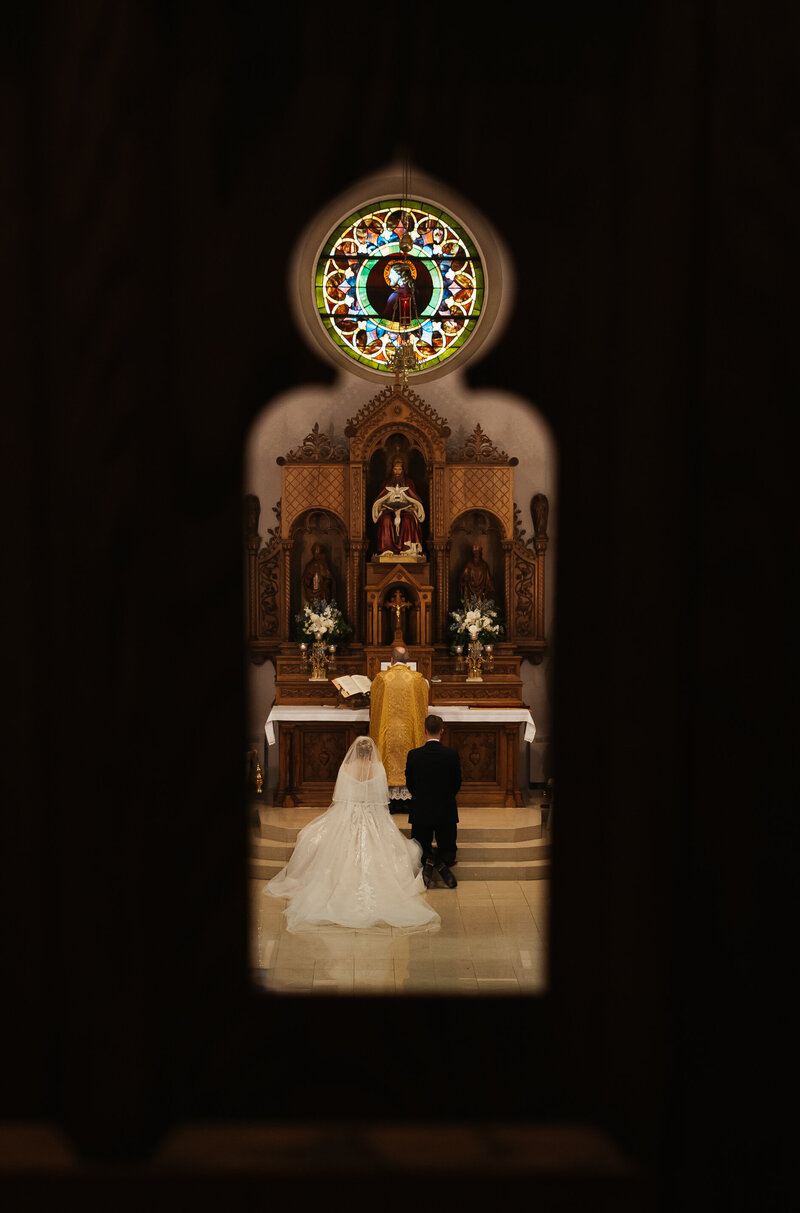 bride and groom smiling at ceremony