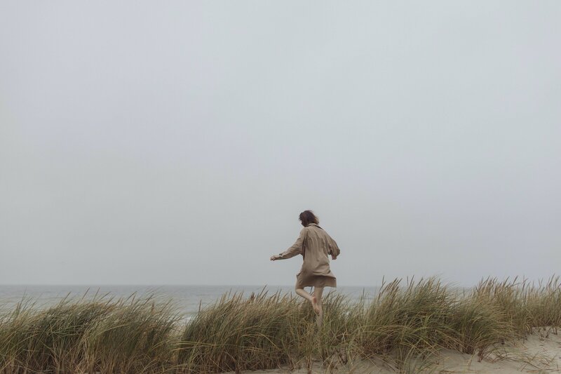 Solstice Acupuncture woman on beach