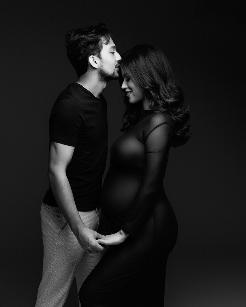 maternity photoshoot with the focus on mom and husband