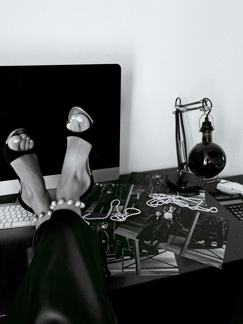 Feet kicked up on desk because when you choose me for SEO + Web Design Services you can relax knowing everything is taken care of