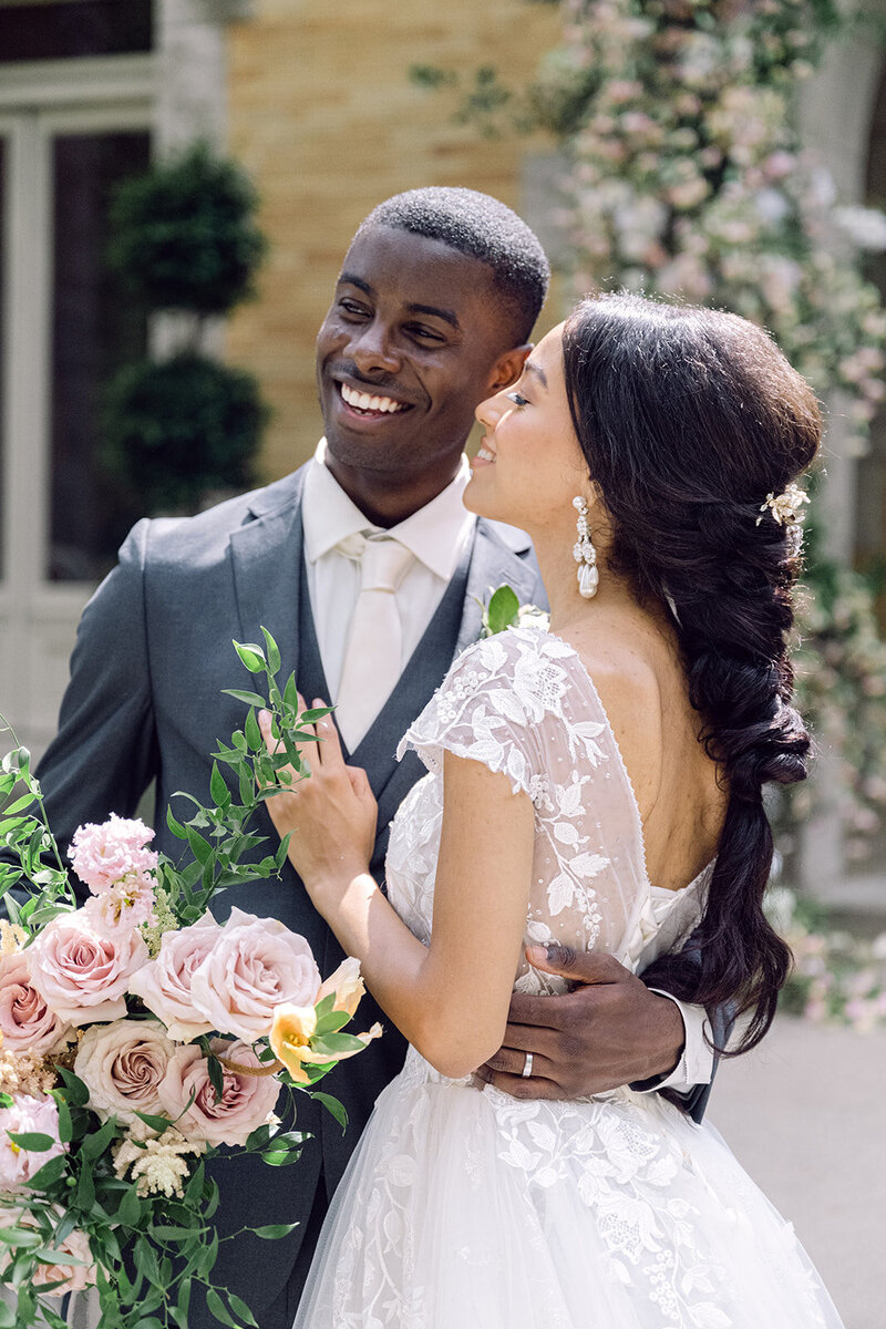 bride and groom smiling