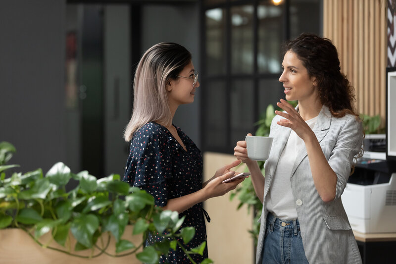 two women talking to each other