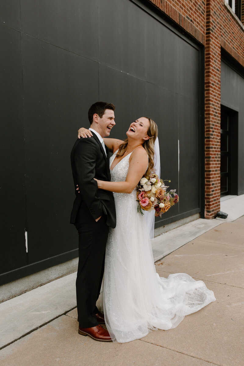 couple standing in a doorway