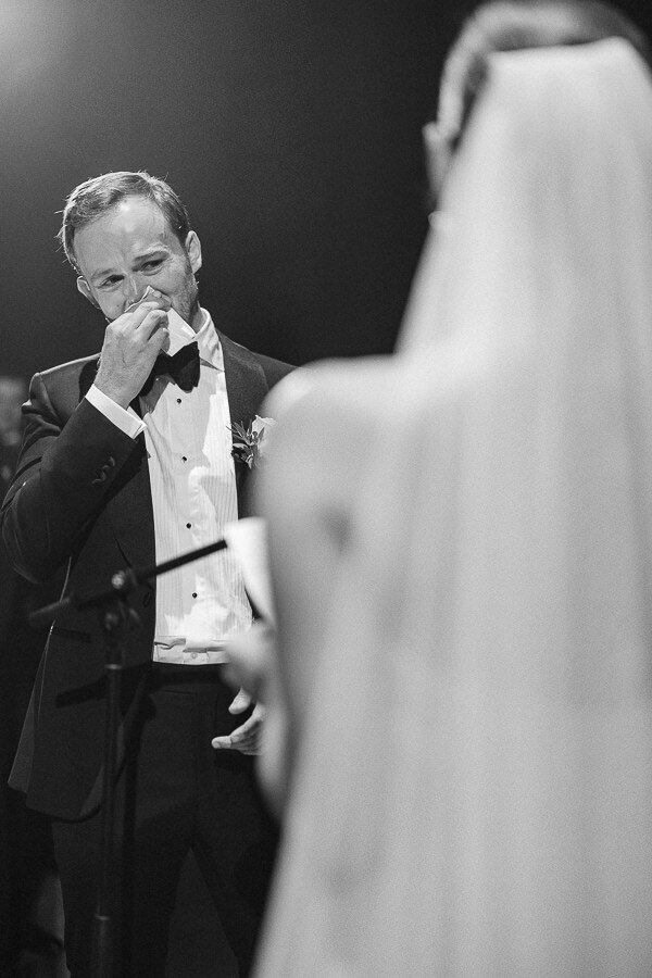 The groom sheds a tear during the reading of the vows. Wedding ceremony in Montreal.