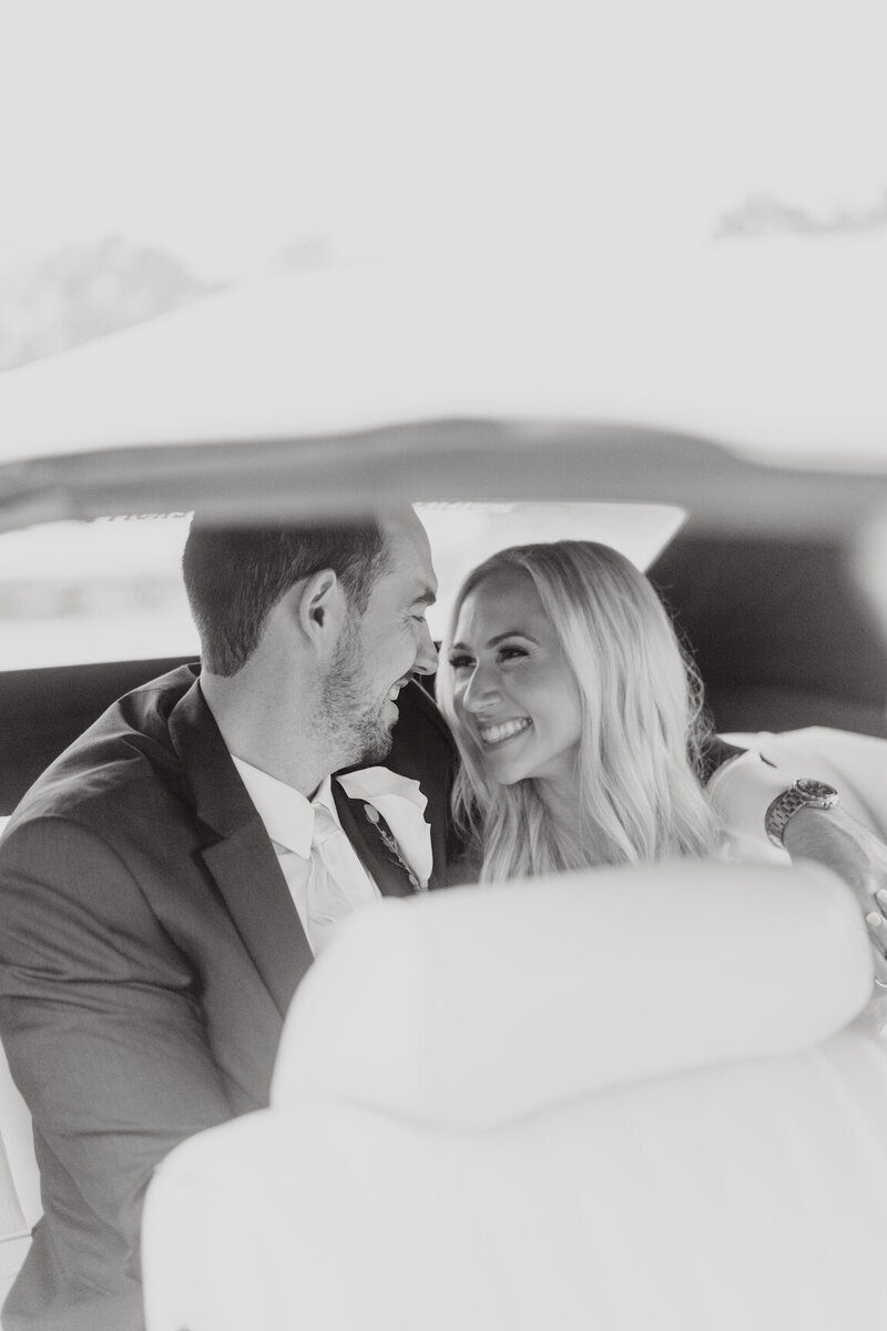 Bride and groom’s grand exit from Canyonwood Ridge reception hall