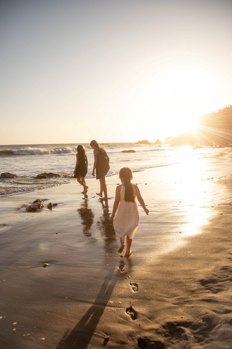 Three kids walking on the beach | Family Photography Session