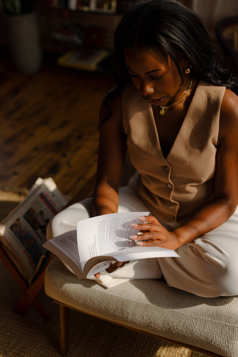 chicago sex therapist reviewing notes in a chair