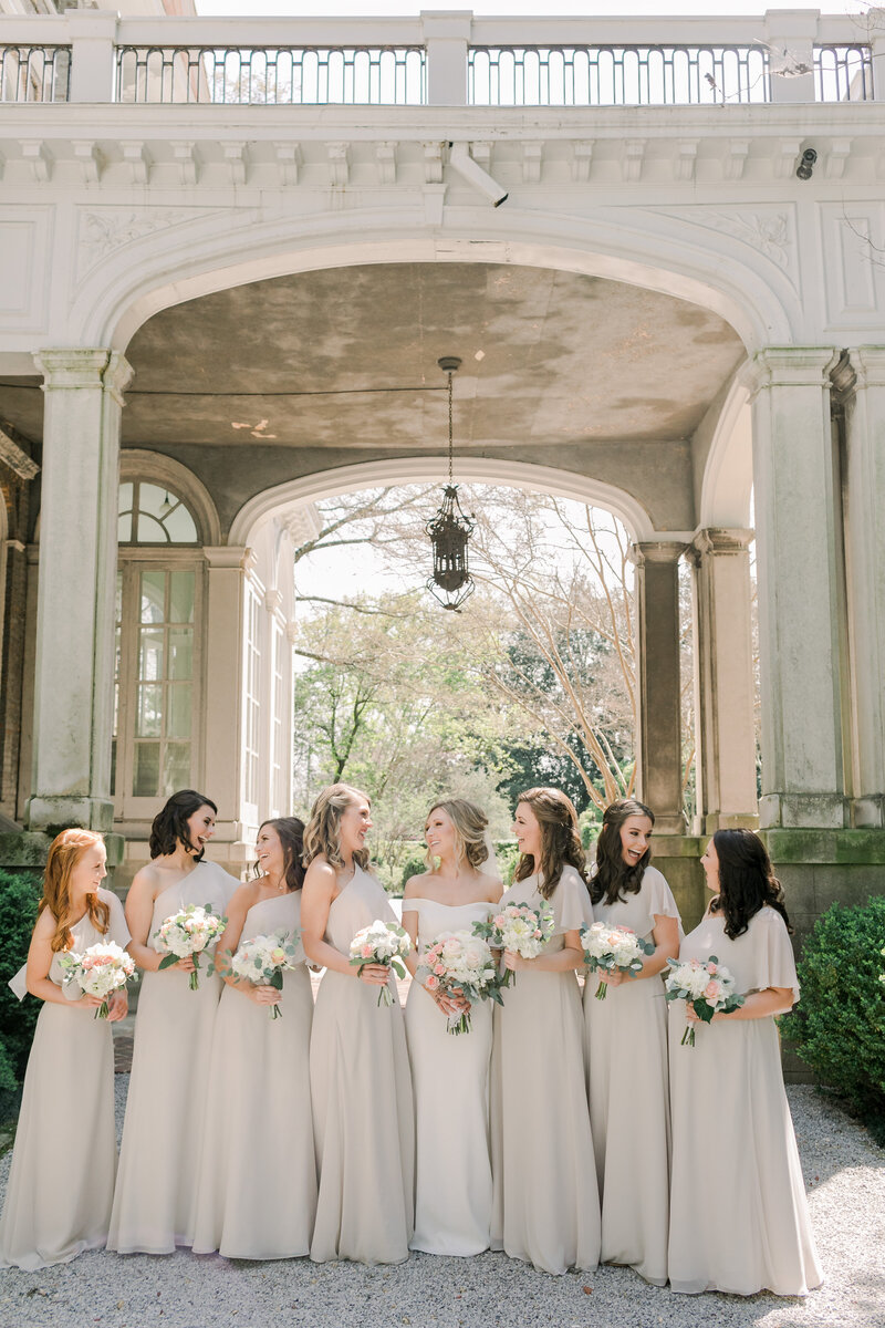 bride wearing anne barge dress laughing with bridesmaids in champagne dresses at annesdale mansion by mary kate steele