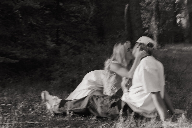 couple leaning in and kissing in grand teton national park