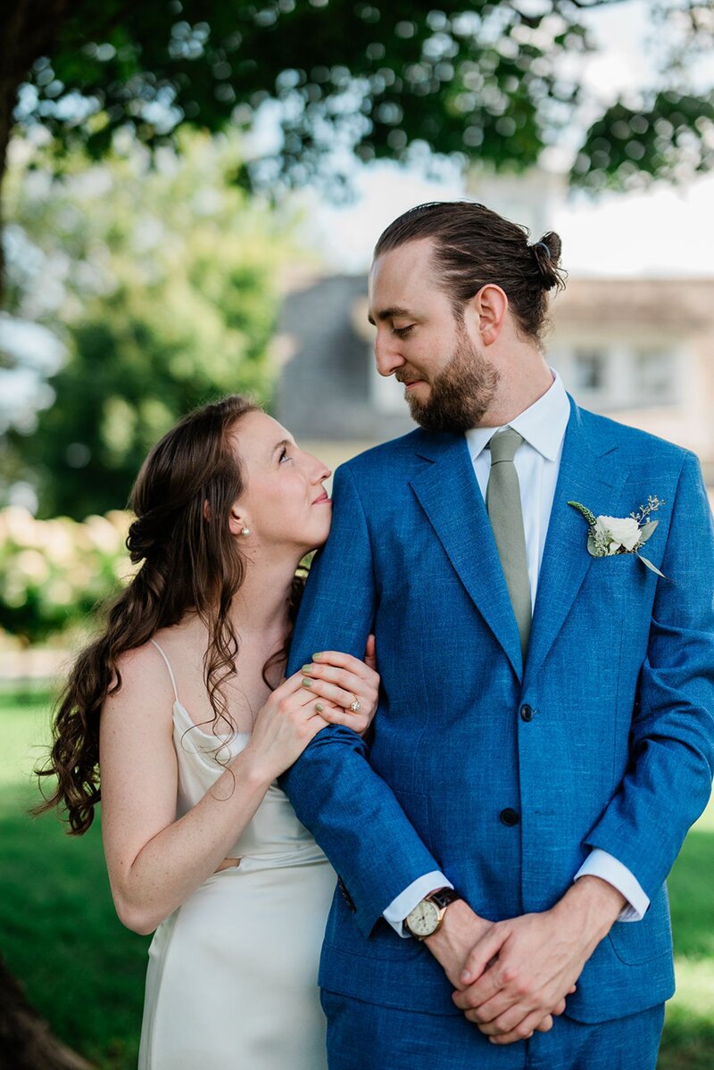 Bride and groom embracing each other