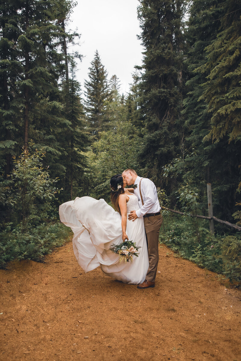 A rainy forest wedding photographed by central alberta photographer Melissa Girard.