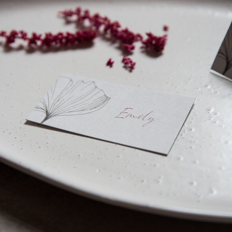 grey elegant flat wedding place card with ginkgo leaf design