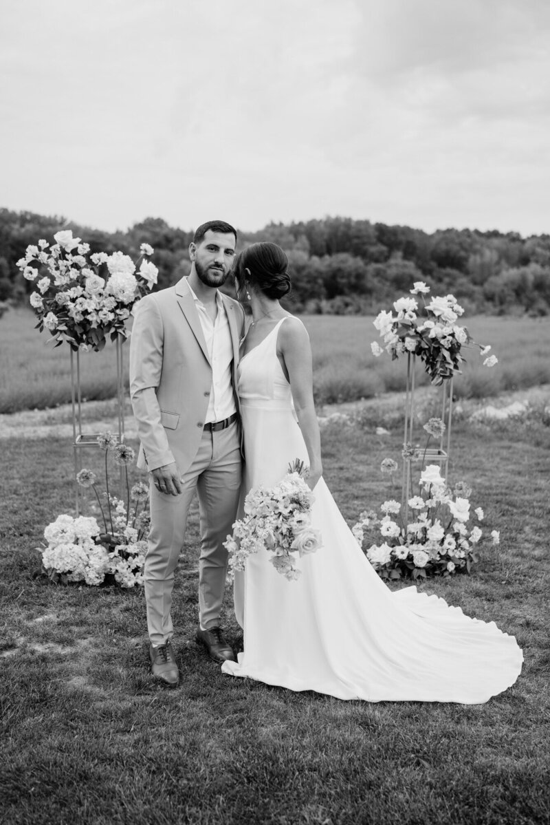 Romantic-outdoor-wedding-in-Provence-with-elegant-floral-arrangements-on-stands