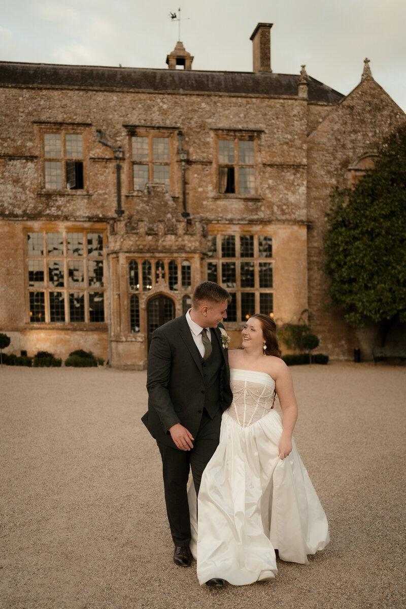 Married couple embracing at Brympton House, Dorset