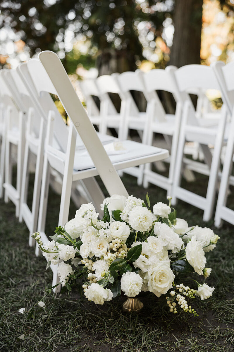 Elegant floral arrangement at the ceremony lawn in Chateau Lill
