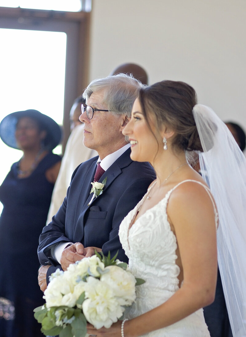 walking down aisle-robin rogers photography-canyonwood ridge-bella by sara-katy reddell