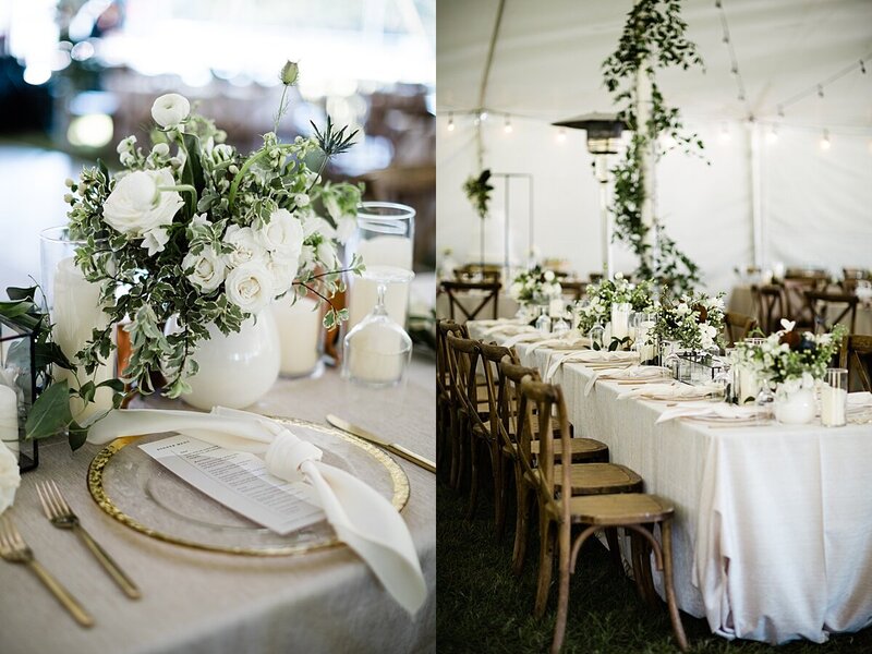 white & green table setting in tented reception