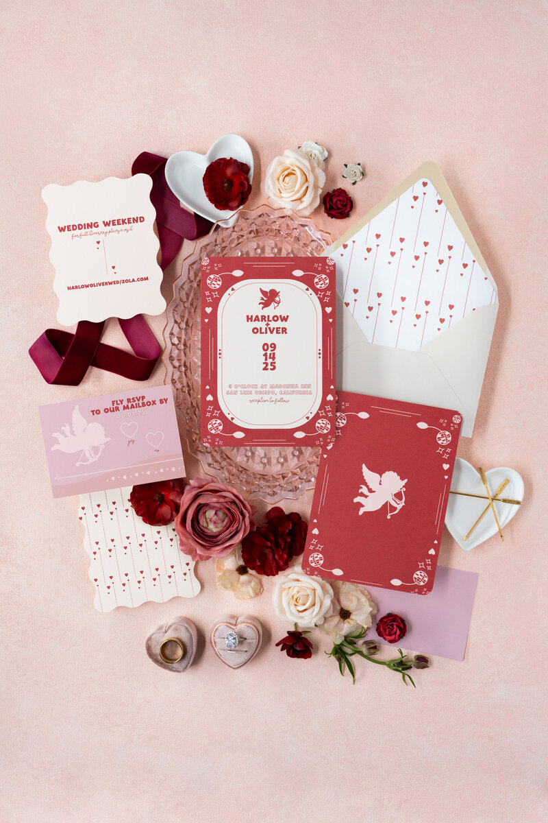 A retro themed wedding invitation suite with record place cards.