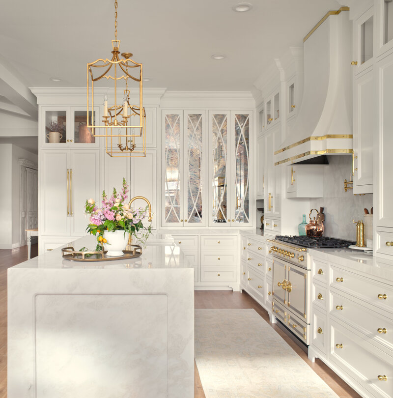 luxury white kitchen with gold accents