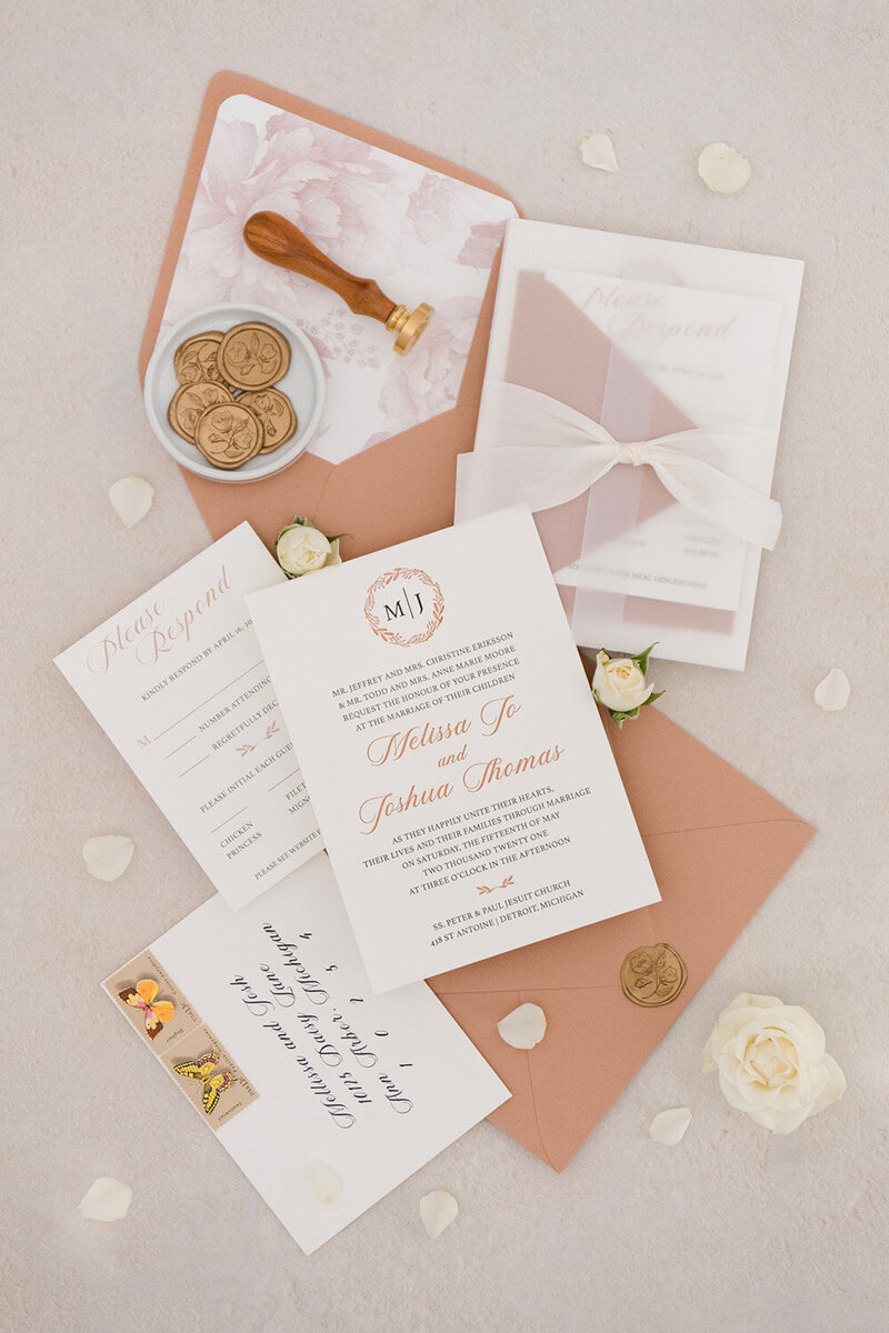 letterpress invitation suite with spice colored accents