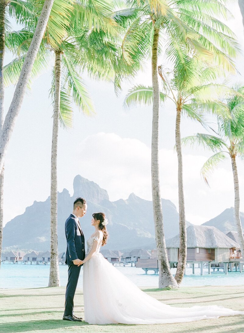 Portrait Bride and groom in front of Mount Otemanu in Bora Bora