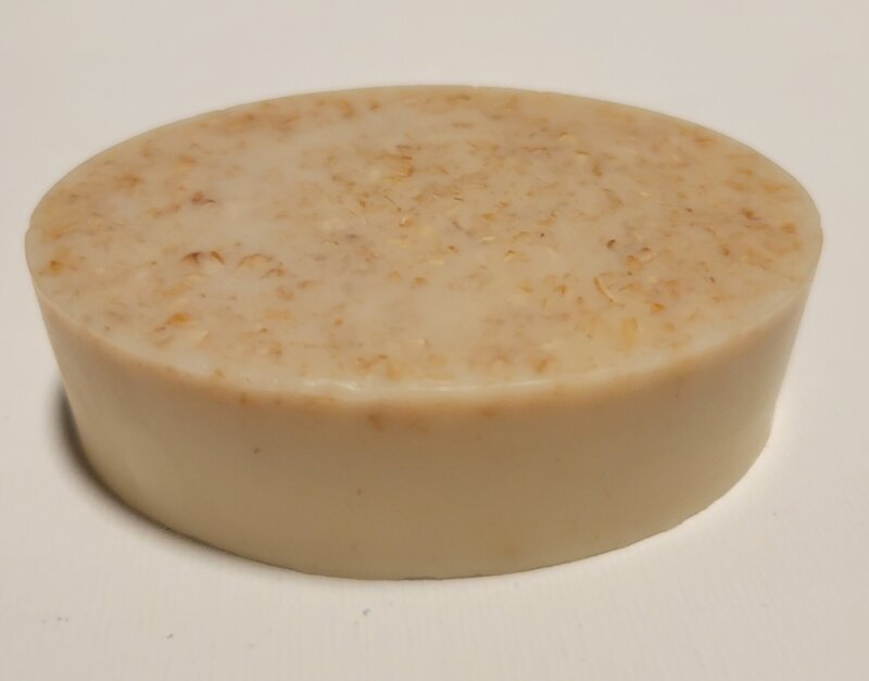 Up close image of Berry and Balm's vanilla oatmeal honey soap with natural ingredients