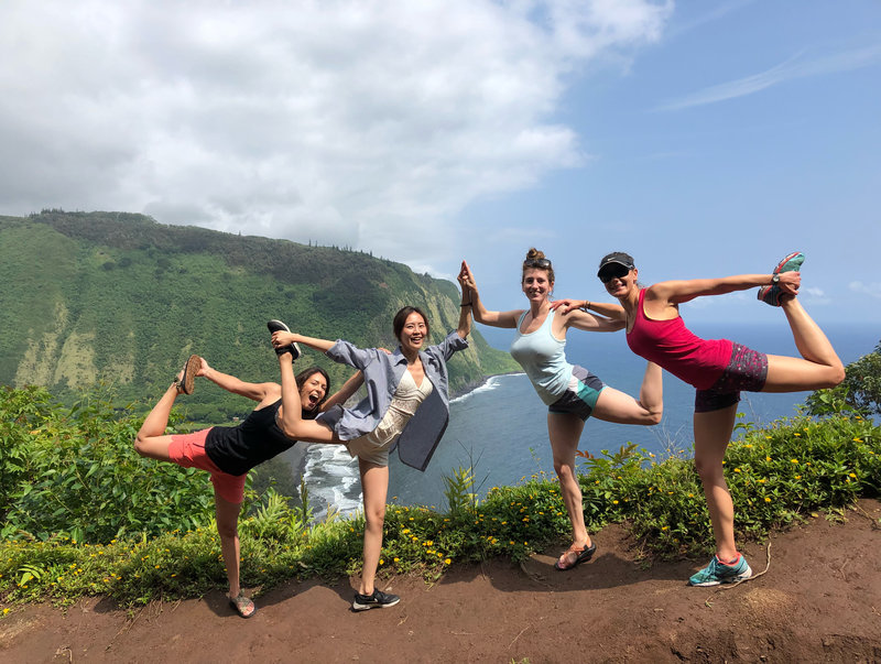 Four Yoga Teacher Training Students doing Goddess Pose in the Hawaiian Islands