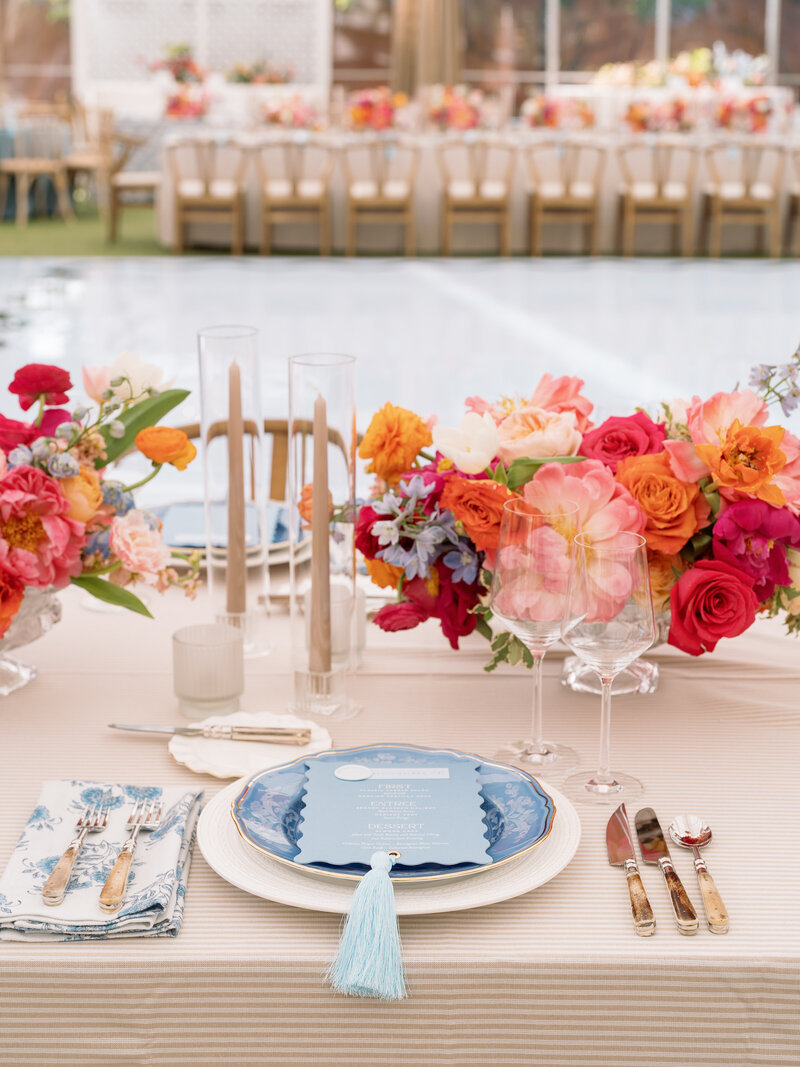 Couple walking through their reception hall at Current Pier 59 in NYC, with planning by Julian Leaver Events