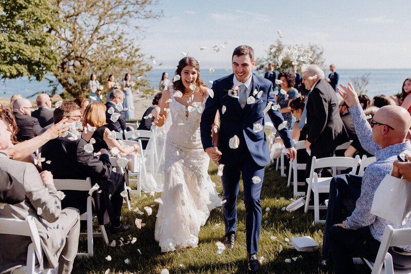 Wedding couple recessional with flower petals  at The Branford House Connecticut