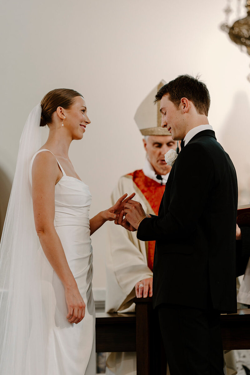 groom twirling bride