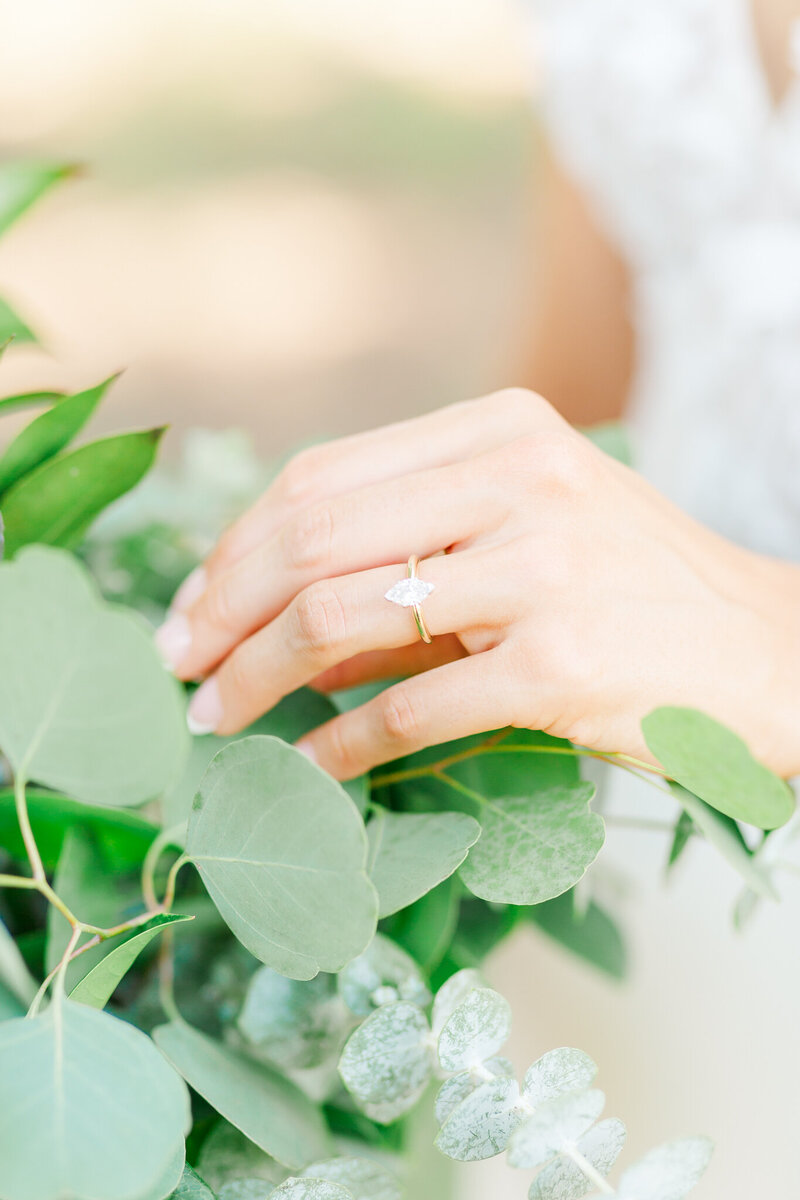 Bride touching eucalyptus bouquet  | Opelika Alabama Wedding 