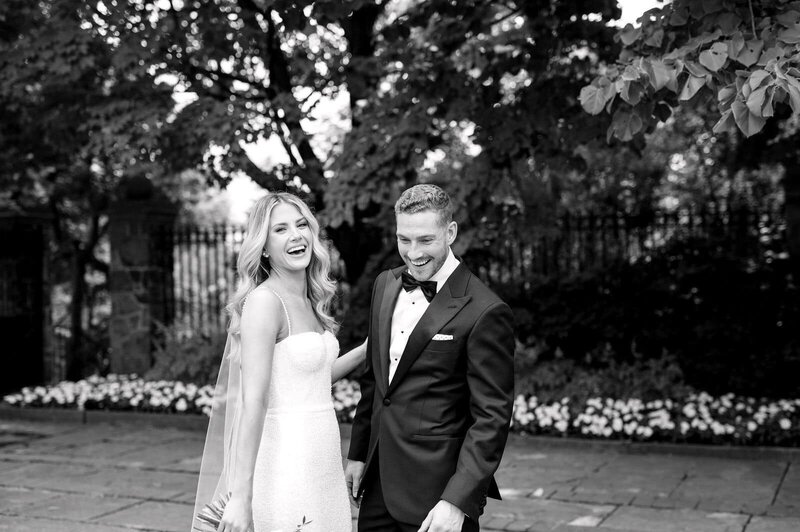 Bride and Groom editorial portraits walking in gardens at Graydon Hall Manor Toronto Wedding Photography | Jacqueline James Photography