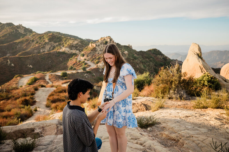bride and groom hugging after elopement ceremony at the beach in california
