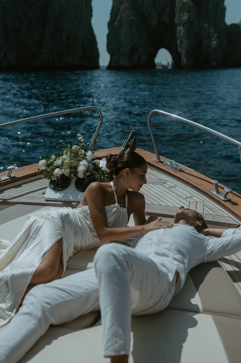 Couple having a intimate moment in the yacht for their engagement session