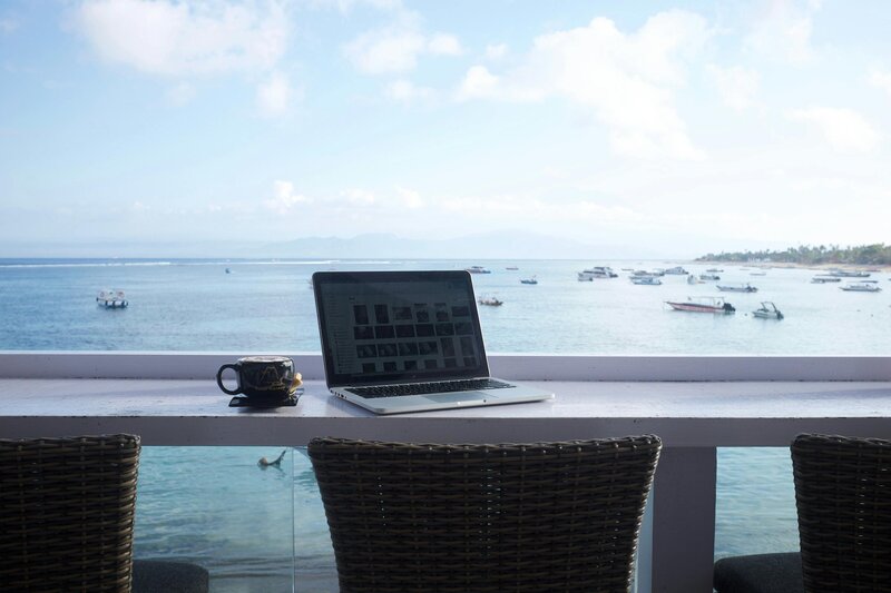 laptop over looking the ocean 