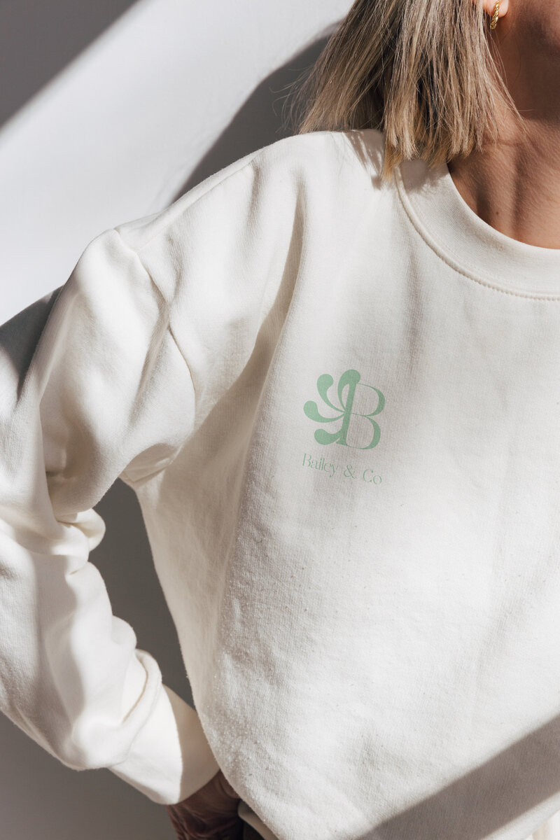 artful minimal upscale finance accountant logo on sweater