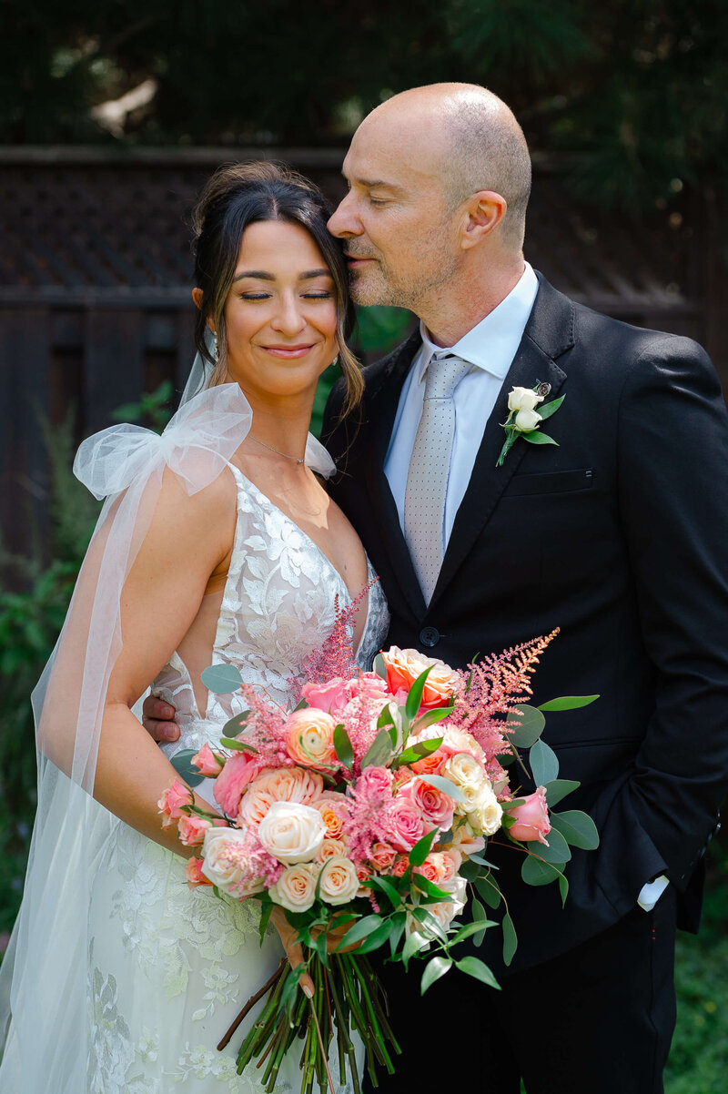 Ottawa wedding photography of a father of the bride kissing his daughter