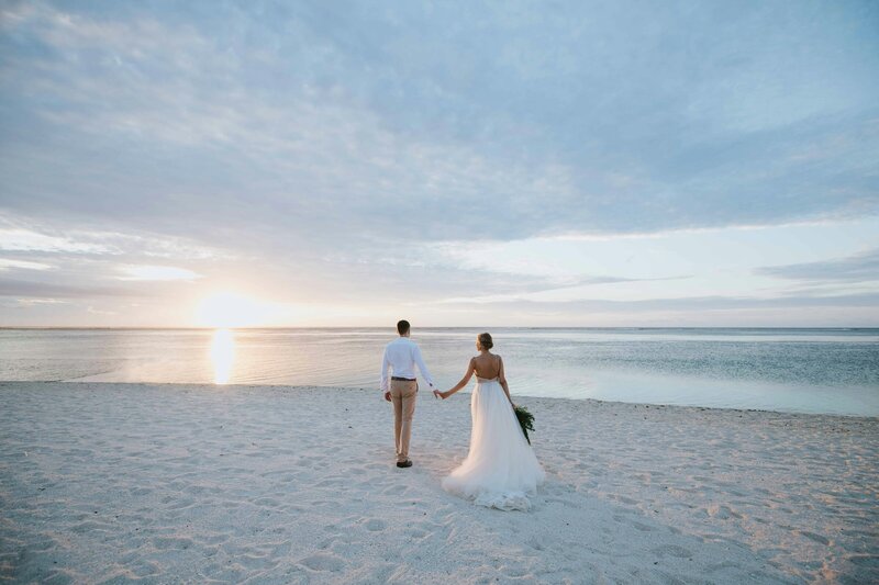 bride and groom at beach wedding